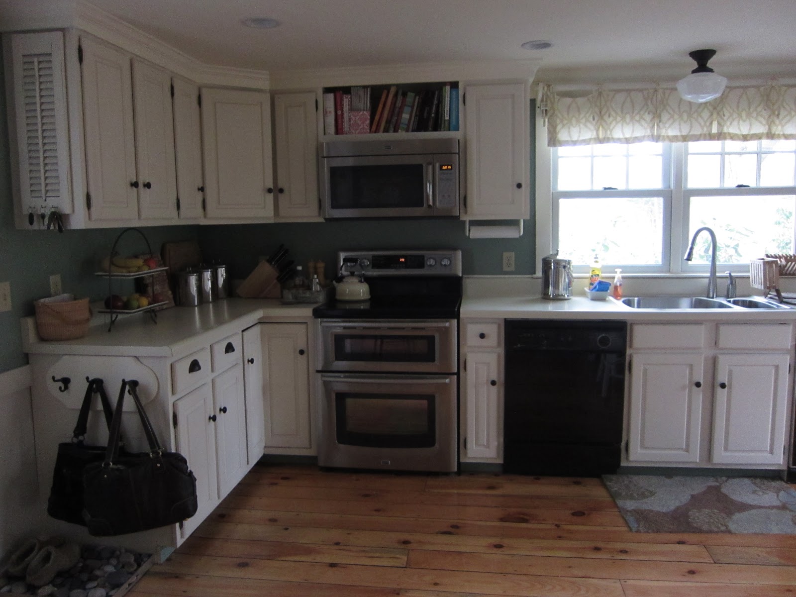 Stained kitchen cabinets Trim above Kitchen Cabinets