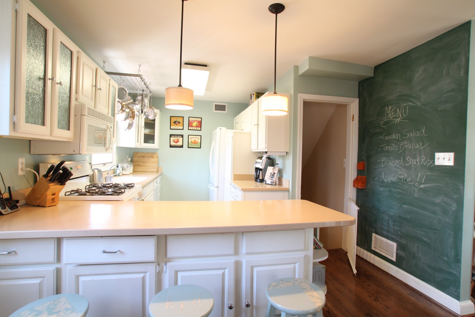 Best rated kitchen cabinets Kitchen with breakfast bar, gas range and oven, glass door cabinets