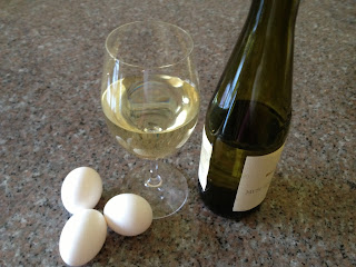 Eggs, wine glass, wine bottle