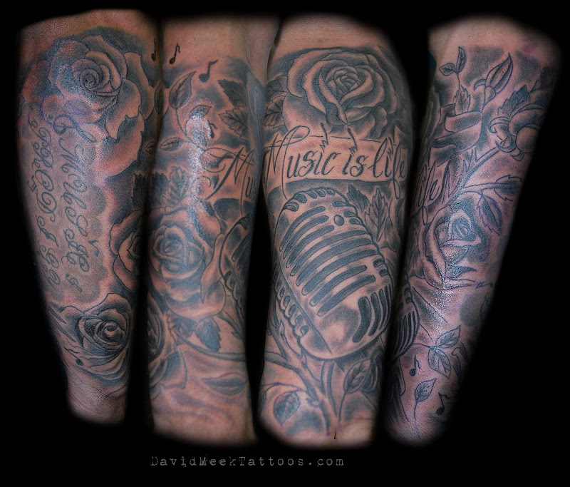 Black and Grey Microphone and Roses half sleeve Tattoo by David Meek  title=