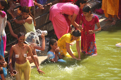 wet indian aunty bathing at river