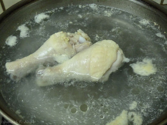 Chicken being boiled for broth for Afritada de Ahab