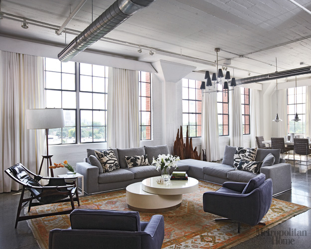 modern loft living room refresheddesigns.: sustainable modern loft in Texas