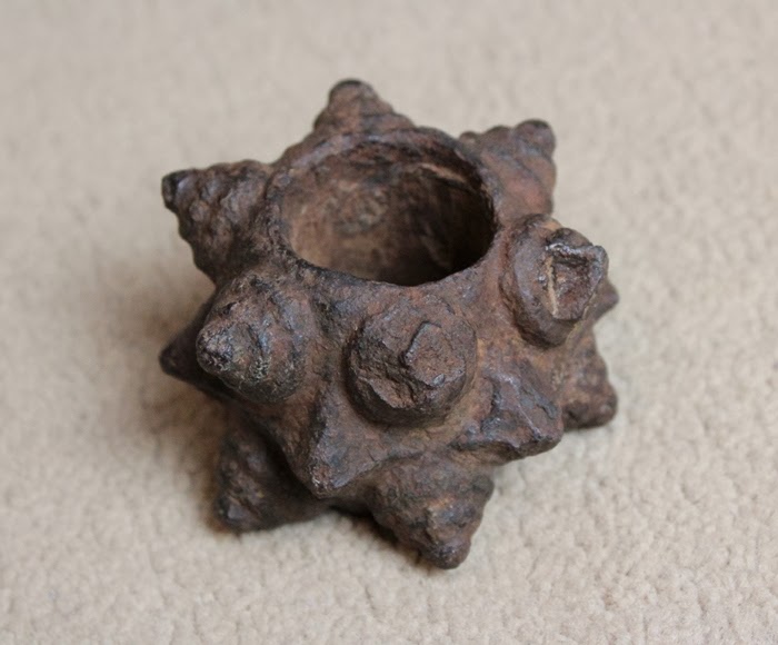 Hands amongst the clouds Iron mace head