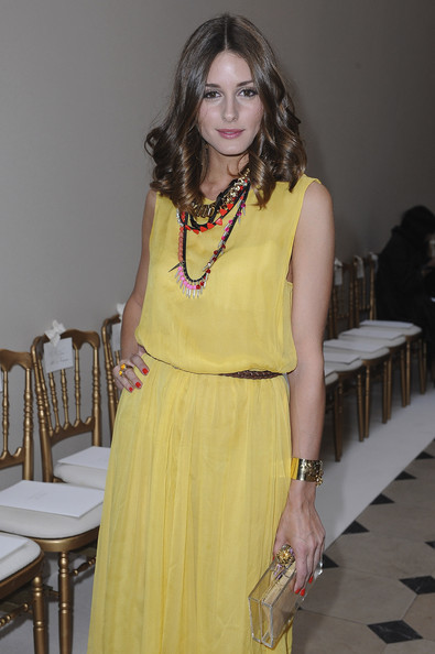 A zest for life! Olivia Palermo makes a fruity fashion statement in vibrant  tangerine peplum suit