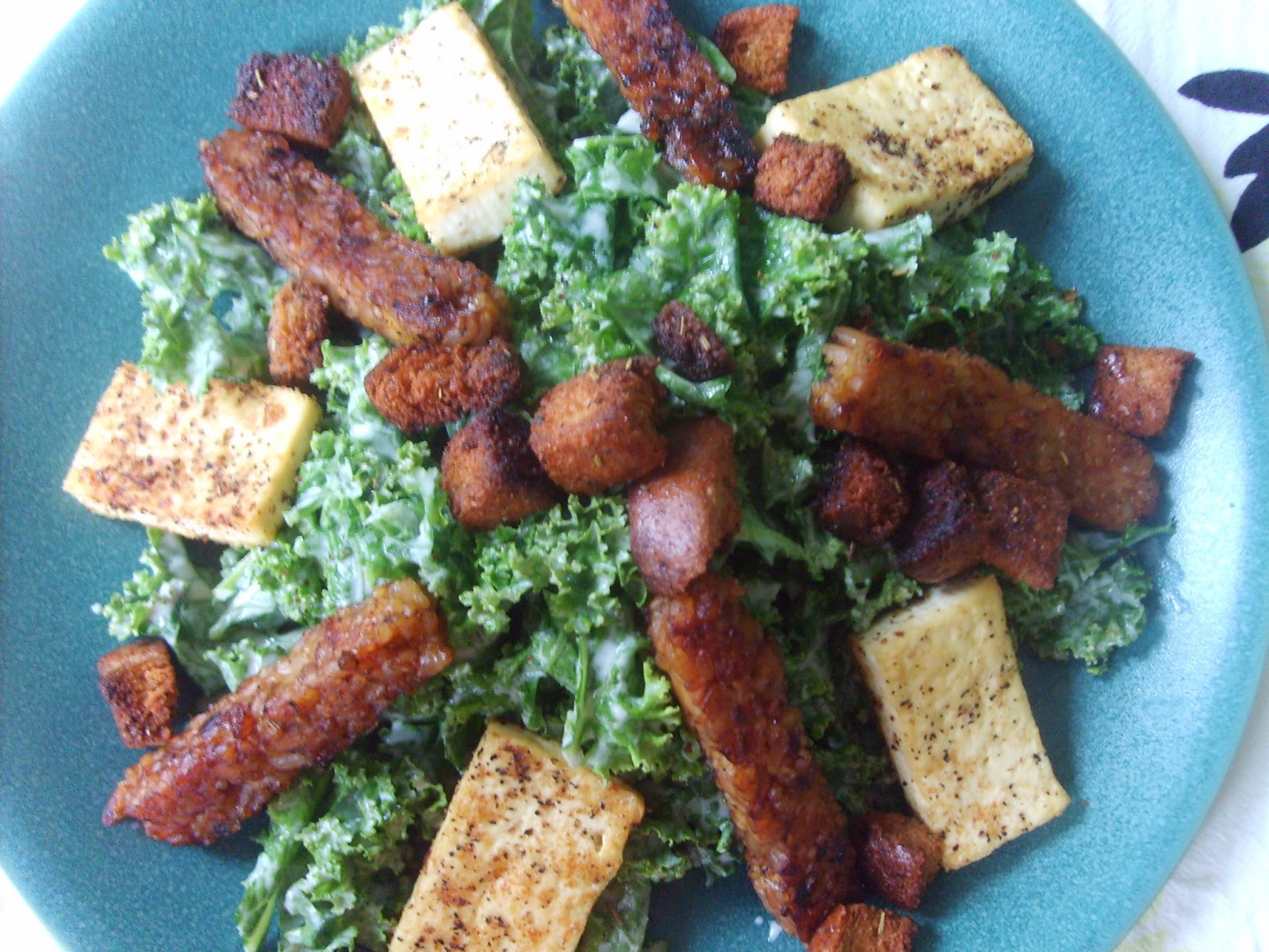 Basil Bakery Kale Caesar Salad with Tempeh Bacon and Tofu
