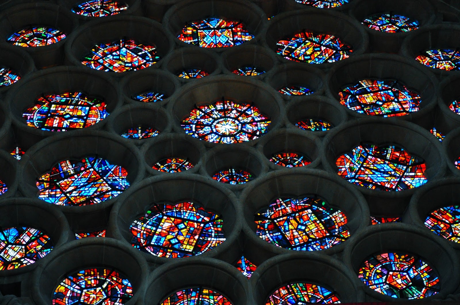 Close-up of the stained glass rosette, St. Albans Cathedral, St. Albans, Herts, England