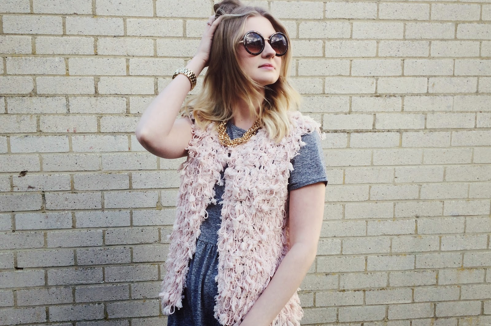 FashionFake, a UK fashion and lifestyle blog. Get cosy and trendy in this pink fluffy gillet by Blue Vanilla!