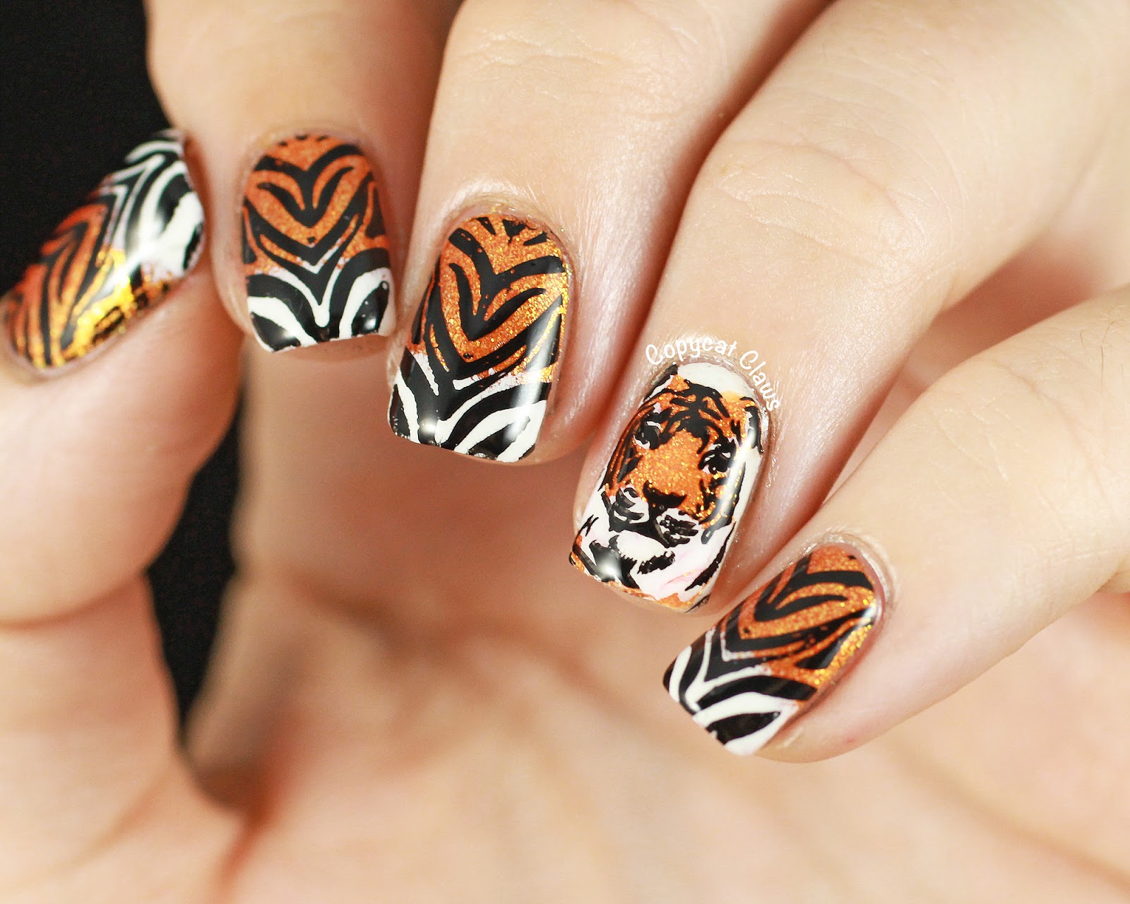 Gold tiger nail design - wide 1