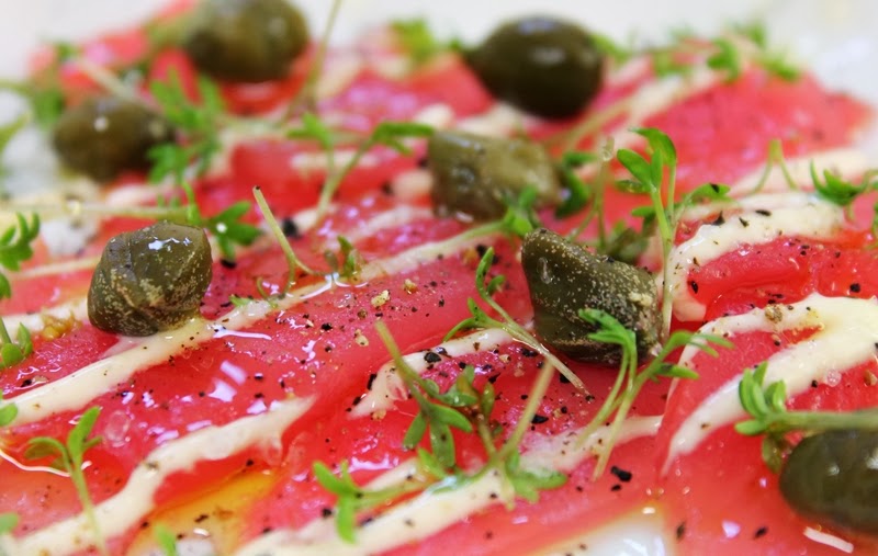 Delicious Tapas Tuna carpaccio with capers & cress 130