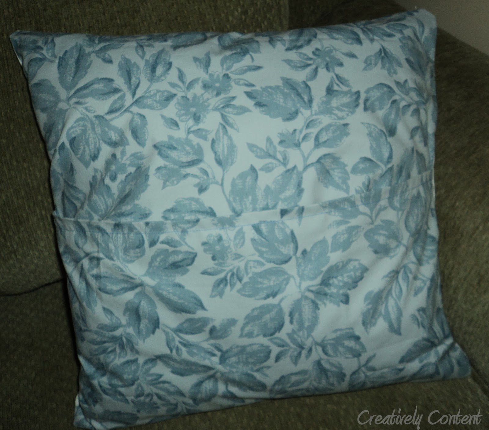 Creatively Content Scrap fabric pillow with a pop