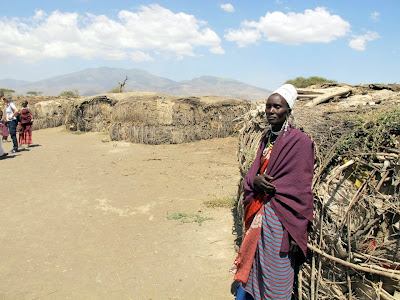 Maasai village with huts, Tanzania, africa by JoseeMM