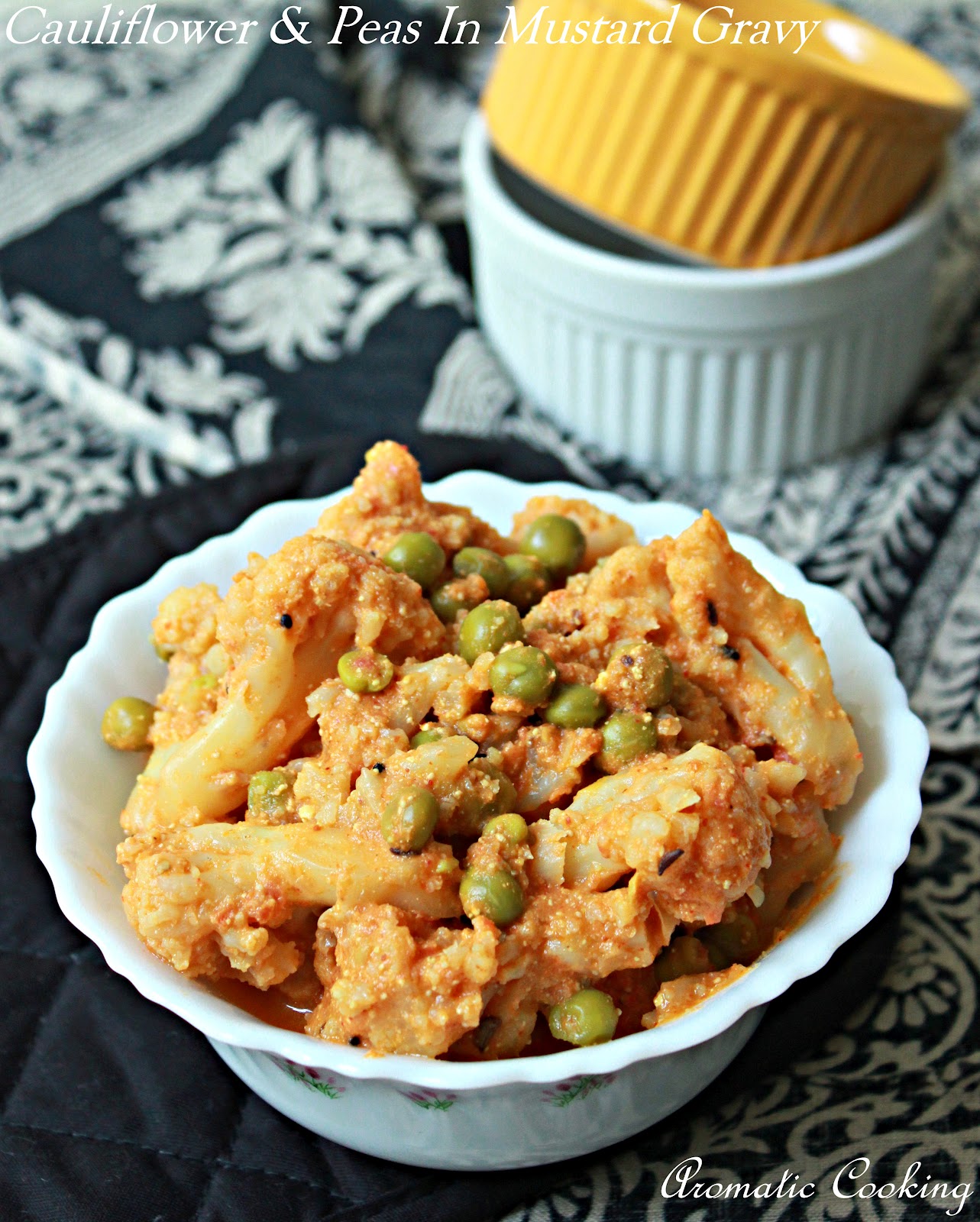 Aromatic Cooking Cauliflower And Peas In Mustard Gravy