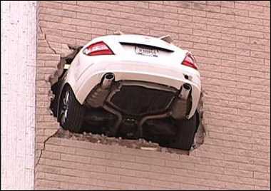 car+crashing+building+crash.jpg