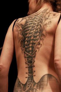 cyborg tattoo on the back