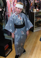 Yukata on small boy Boy wearing a Yukata with Japanese headband from Kimono House NY