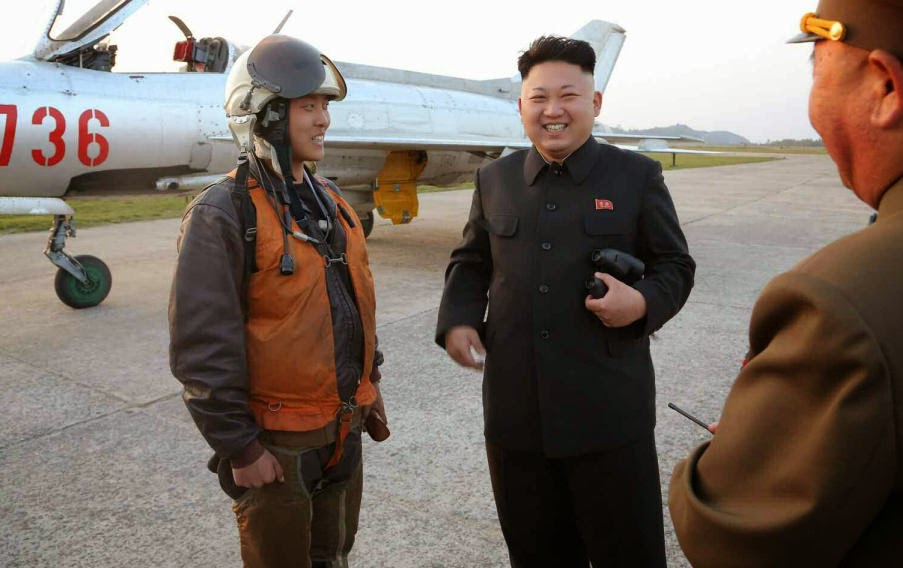 النشاطات العسكريه للزعيم الكوري الشمالي كيم جونغ اون .......متجدد  Kim+Jong-un+guiding+Air+Force+MiG-21+during+flight+training+7