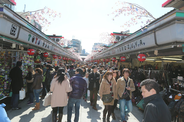 You will find typical Japanese souvenirs and snacks along the shopping street of Nakamise after passing the outer gate of Asakusa Sensoji Temple in Tokyo, Japan You will find typical Japanese souvenirs and snacks along the shopping street of Nakamise after passing the outer gate of Asakusa Sensoji Temple in Tokyo, Japan