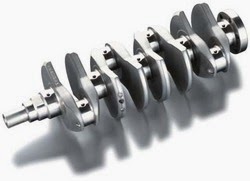 What is the function of a crankshaft in an engine?