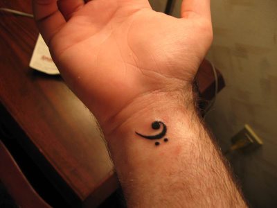 cute wrist star tattoo for