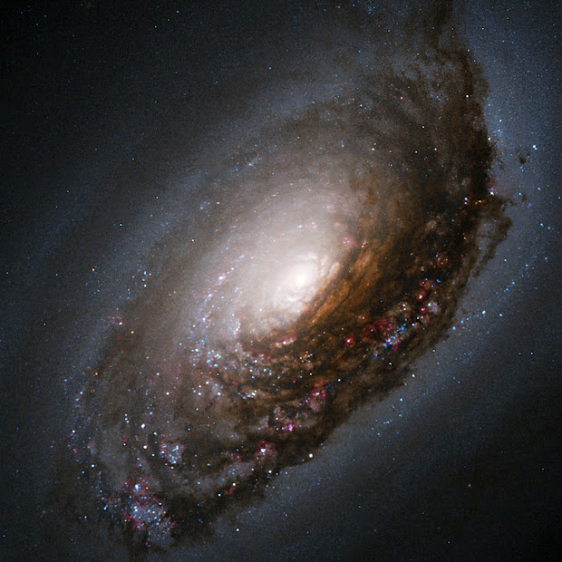 An abrasive collision: M64, the Black Eye Galaxy by Hubble