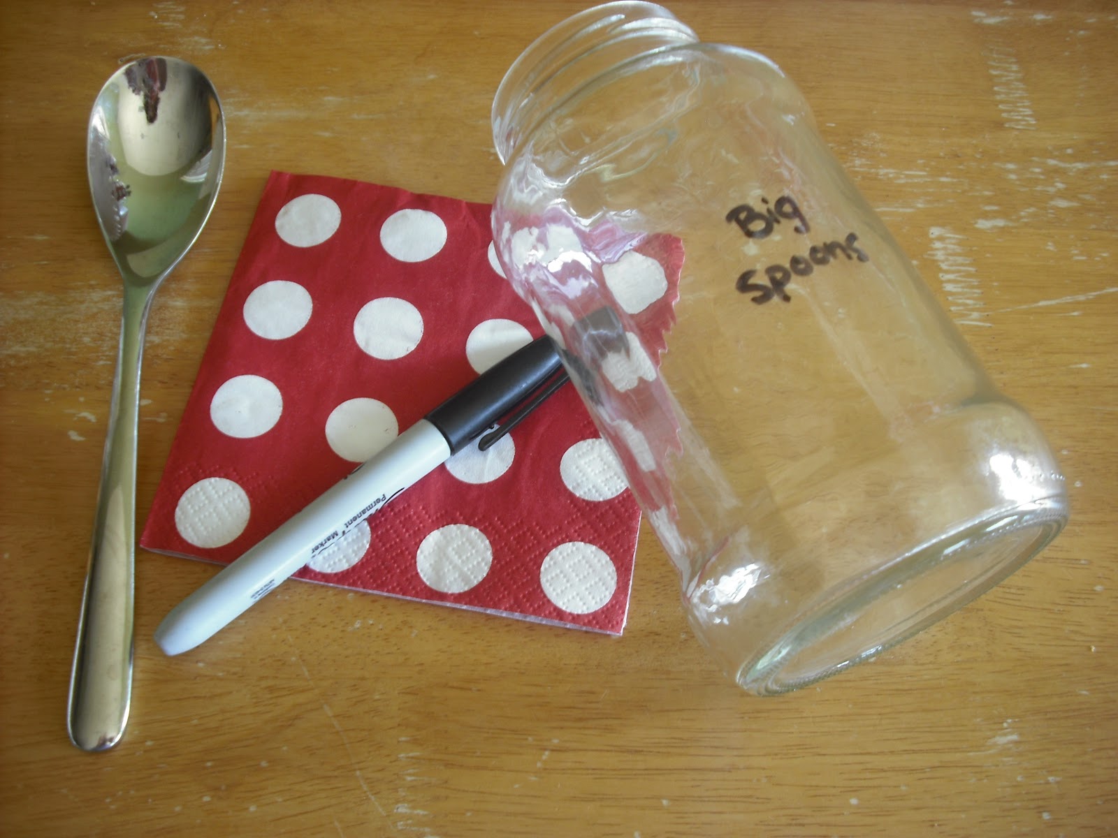 Polka Dots and Recipes Glass jars and Party Napkins hold my Silverware