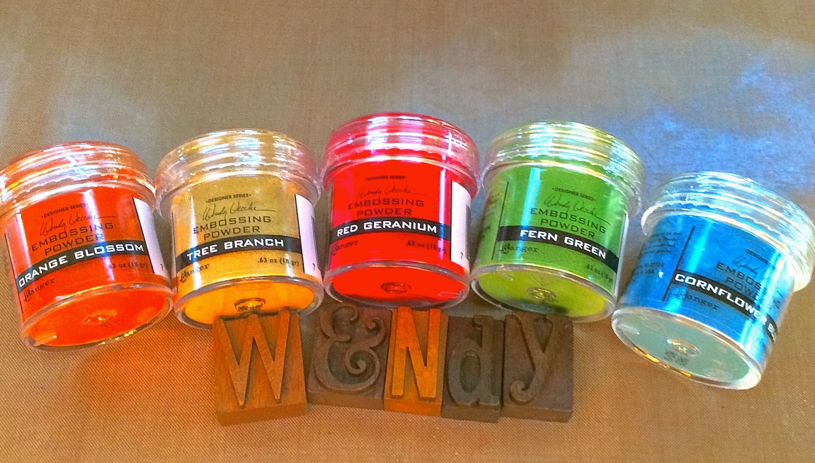 Studio 490 altered with distress spray stain & embossing powders...