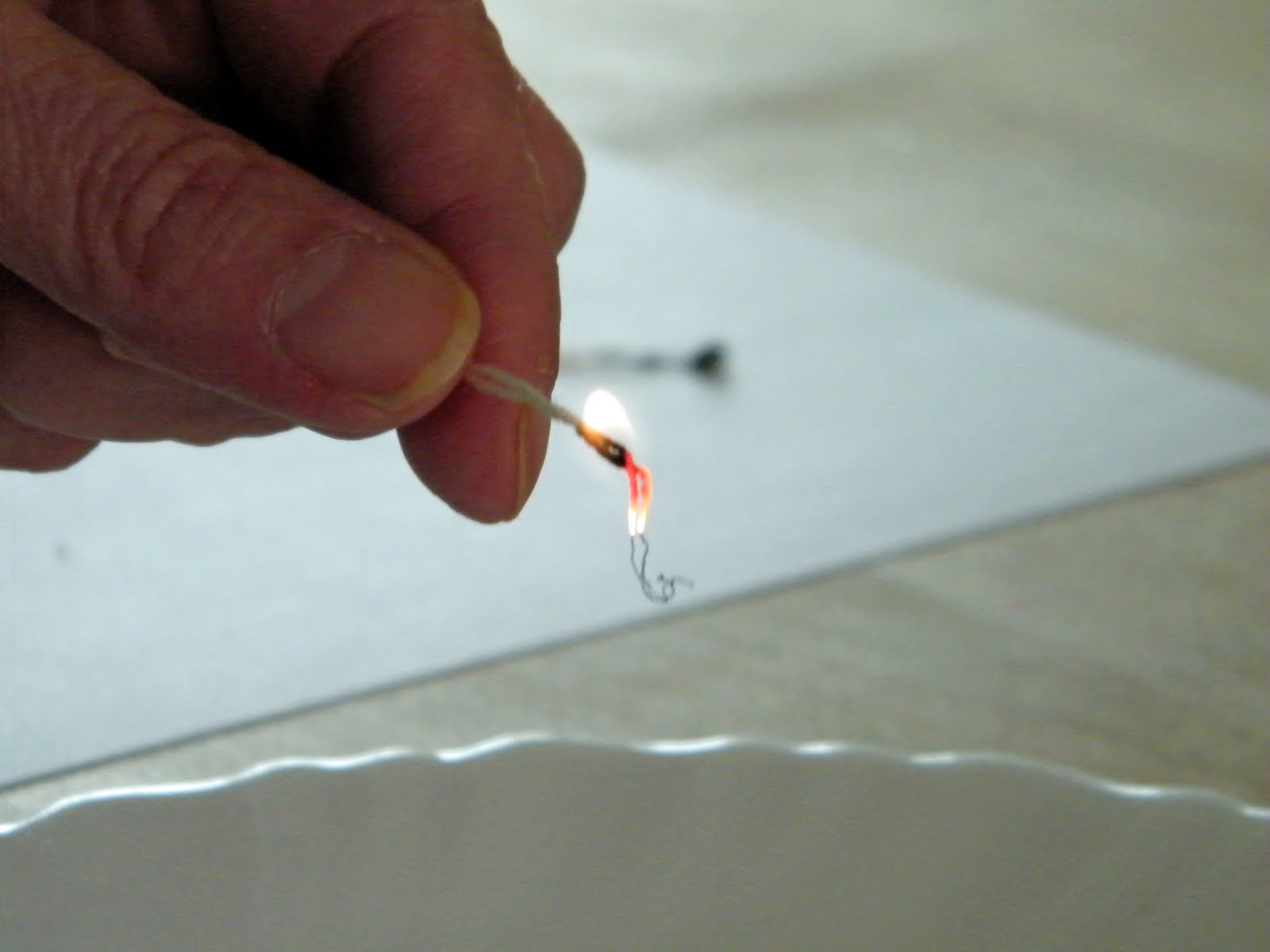 Dust Bunnies Under My Loom April 2011