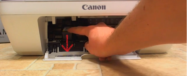 presionando para abajo a quitar cartucho de tinta presionando abajo para quitar cartucho de tinta canon mg2410