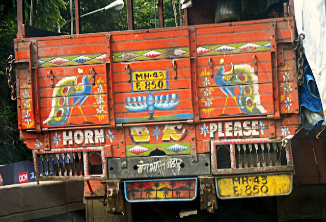 peacock painting on back of truck