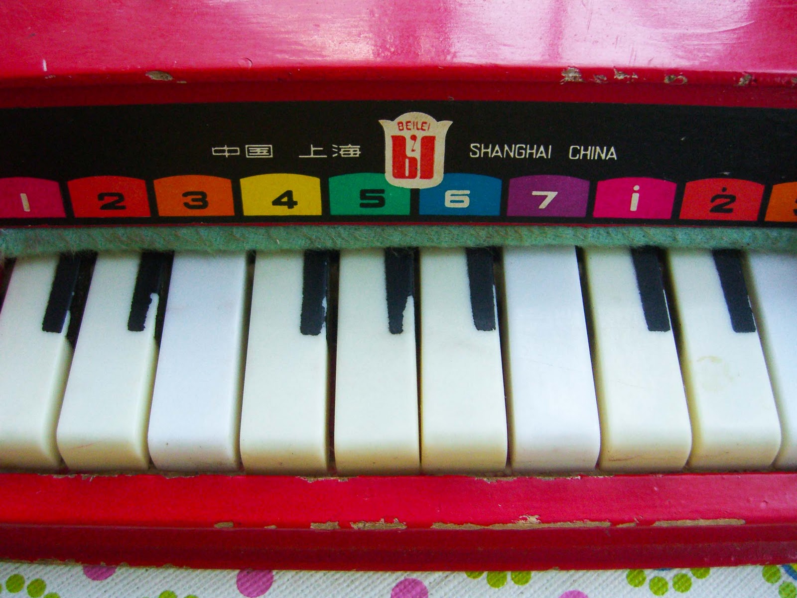 Vintage toy baby pianos