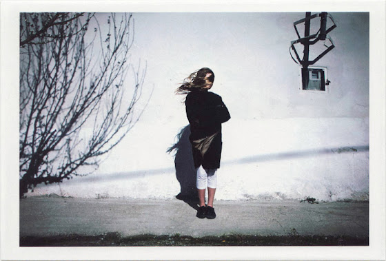 dirty photos - Once - street photo of girl with windy hair motion