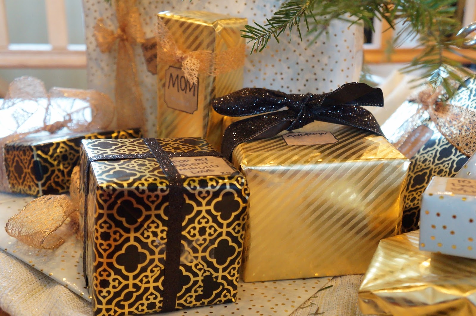 gold black and white wrapped presents