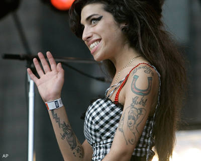 http://2.bp.blogspot.com/-OsyfMI_fD94/TWWxH2g2API/AAAAAAAAAu8/AGfvtO6OKm0/s1600/amy-winehouse-tattoo.jpg