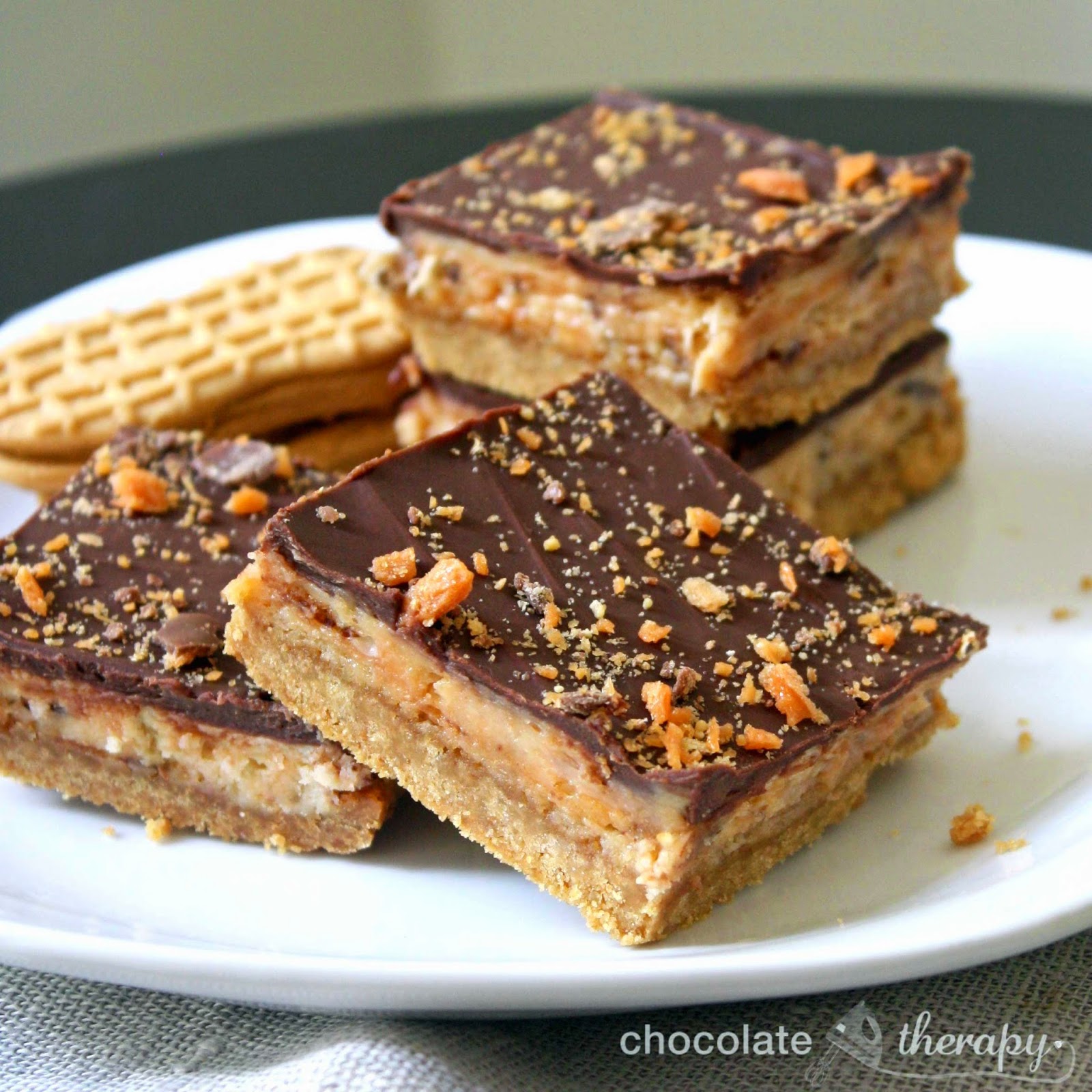 Chocolate Therapy Butterfinger Nutter Butter Cheesecake Bars