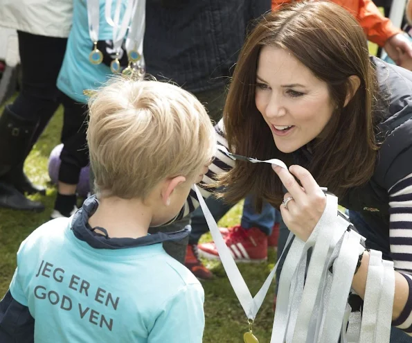 Crown Princess Mary of Denmark participates in Crown Princess marys 's Foundation's children's relay race (Børnestafet) against bullying in the Botanical Gardens in Aarhus