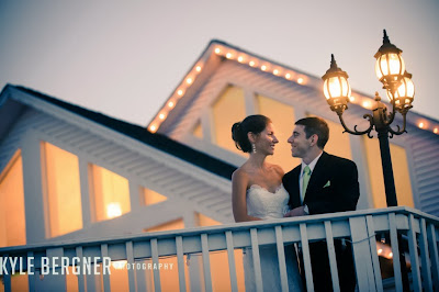 Sunset portrait of the Bride and groom on the deck