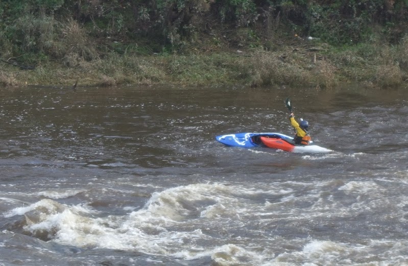 Halfie Dicing with death on the Dee kayaking down the weir