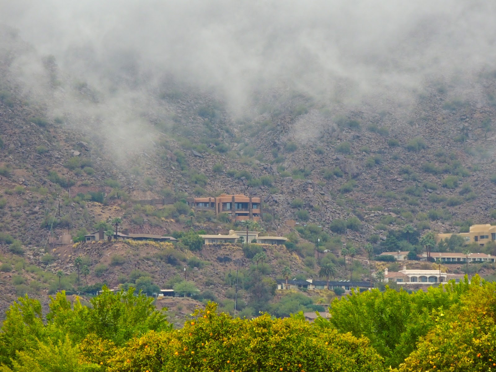 Scottsdale Daily Photo Photo Camelback Mountain homes under the clouds
