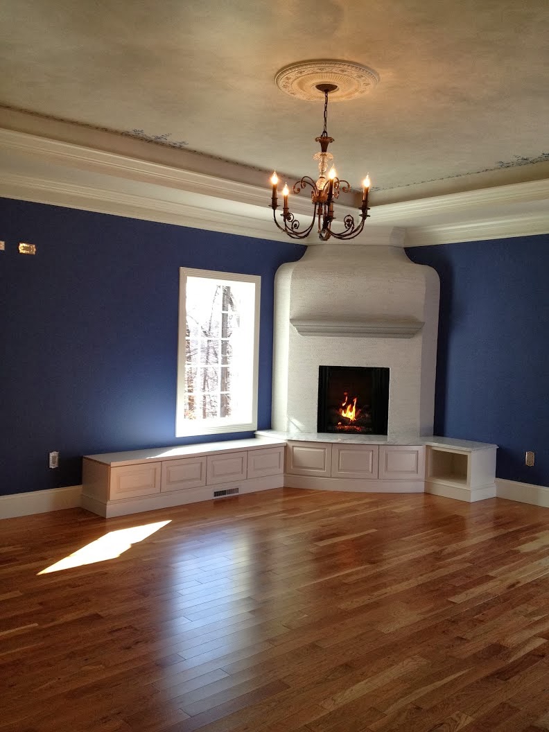 Please help me design a window seat beside a corner fireplace