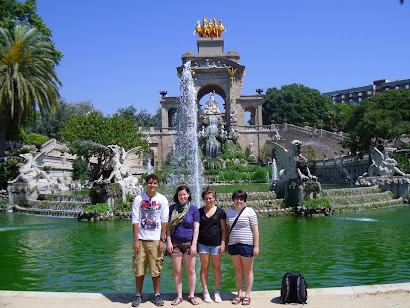 Golden fountain in a huge barcelonean park