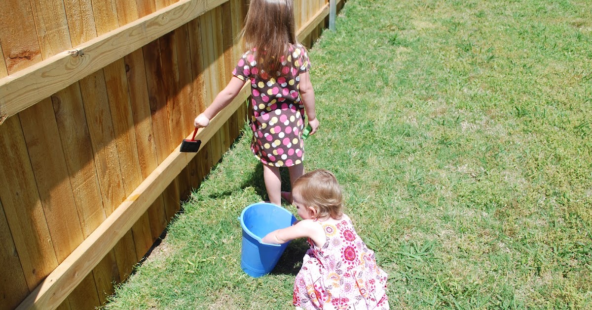 Random Thoughts and Polka Dots Water painting the Fence!