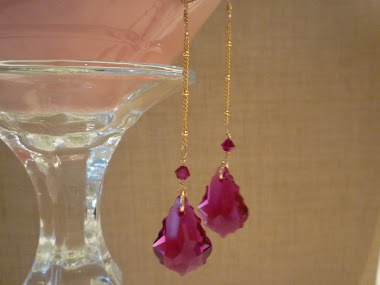 Gorgeous baroque shaped ruby Swarovski crystals dangling from 14K gold filled decorative chain