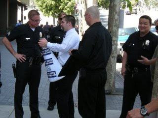 Andrew Mendez meets with police officers summoned by L.A. Times staff.