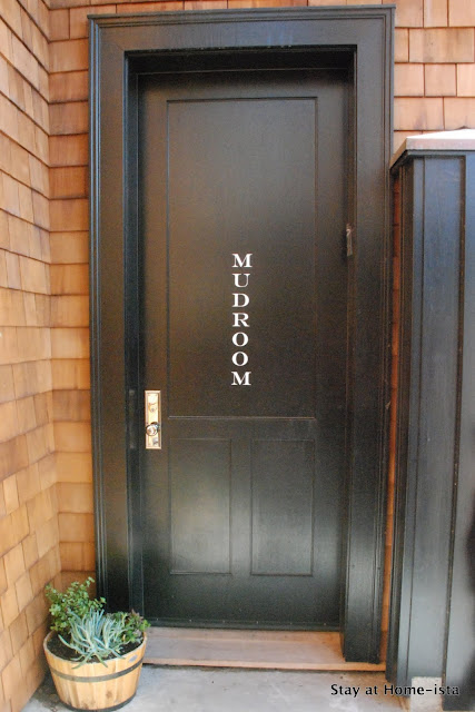 Stay at Home-ista: Mudroom door with vinyl letters and a pot of succulents.