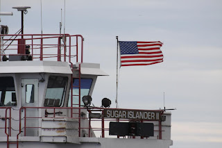 ferry sugar island flapping flag shot just