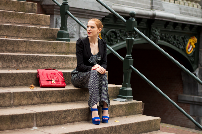 Fashion blogger outfit in Amsterdam with a polka dot jumpsuit