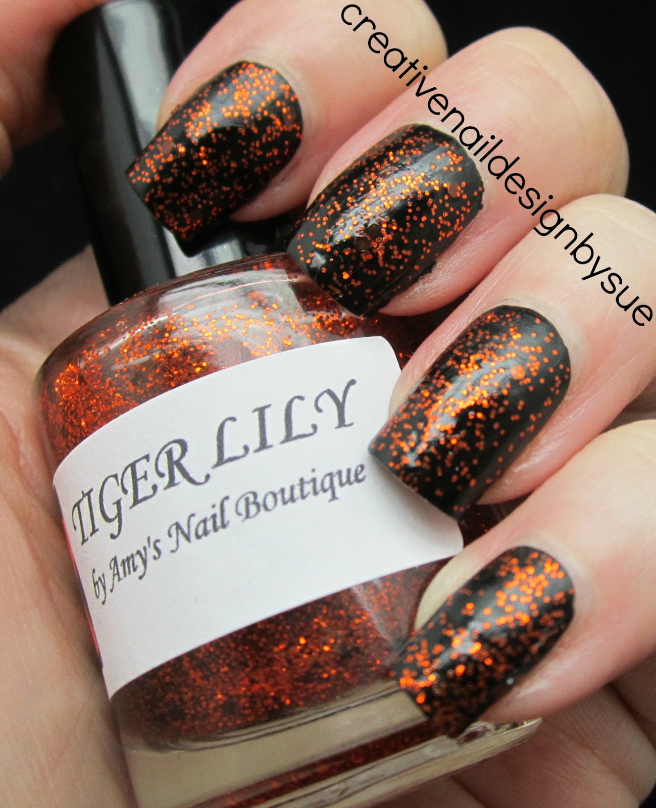 Creative Nail Design by Sue Amy's Nail Boutique Tiger Lilly