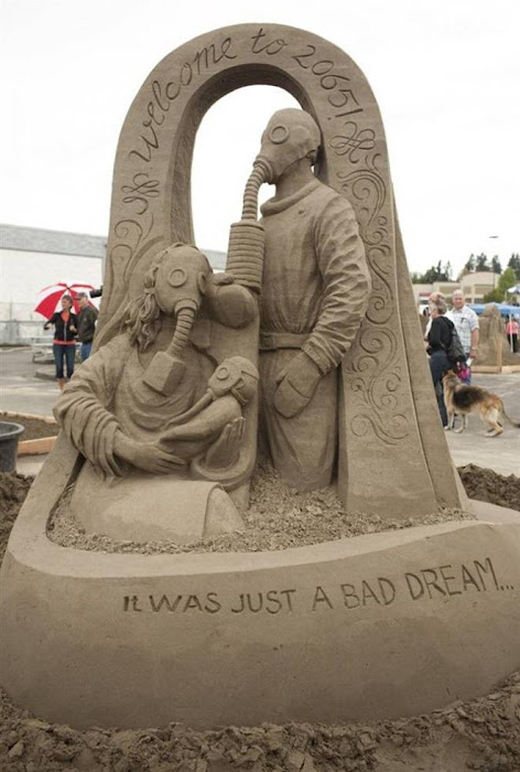 Sand Sculpture Art Work - Sculptures working on his creation...