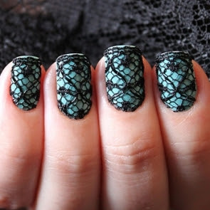 Fashionista Mommy 101 shows a few other lacey nail art designs AND a